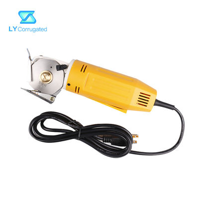 Forbici elettriche gialle del tessuto 170W intorno ai pezzi meccanici portatili del tessuto della lama di taglio